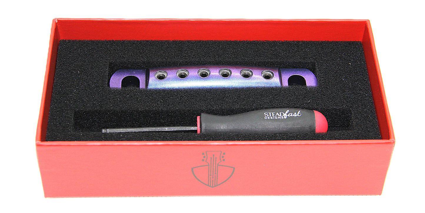 Blue Purple colorshift stopbar for guitars. Made from lightweight aluminum. With tool in box.
