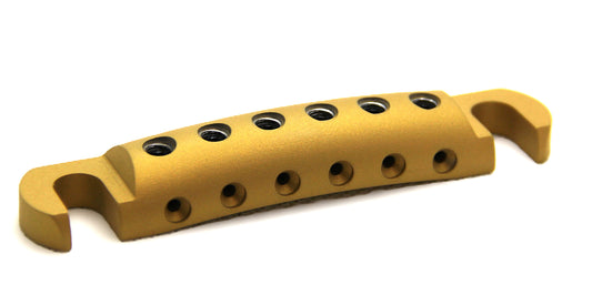 Gold Cerakote aluminum stopbar with black screws.