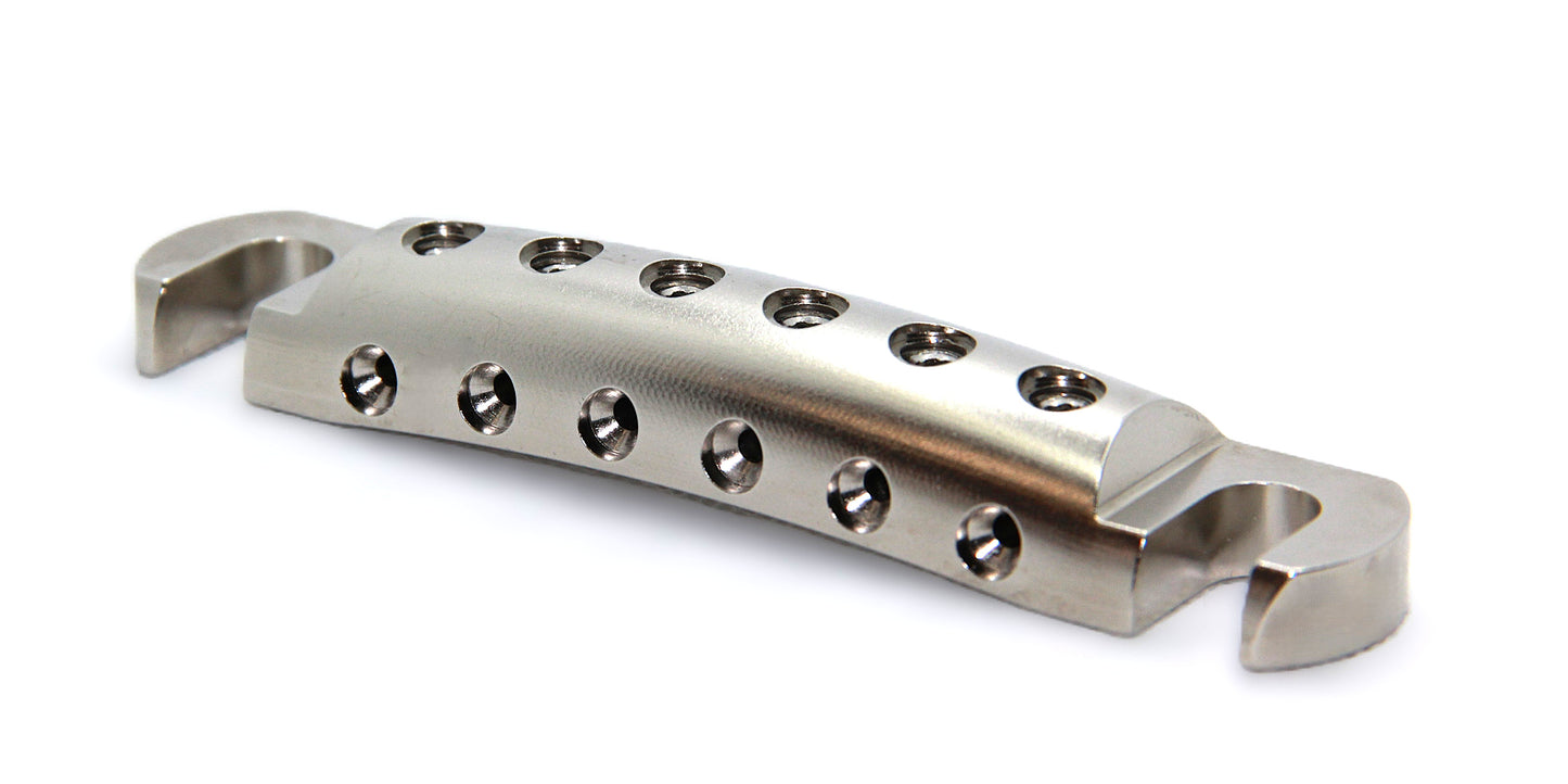 Inexpensive, lightweight, CNC aluminum guitar stopbar.  Nickel plated.