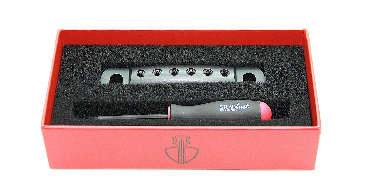 Lightweight locking stopbar in black anodized aluminum.