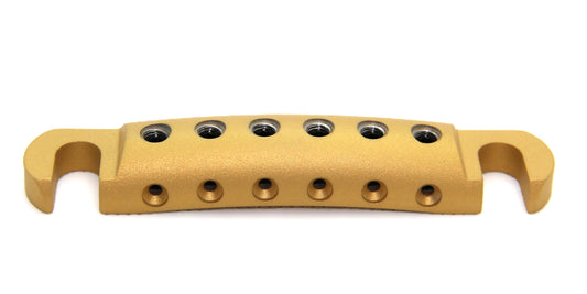 Gold Cerakote guitar stopbar with black screws.
