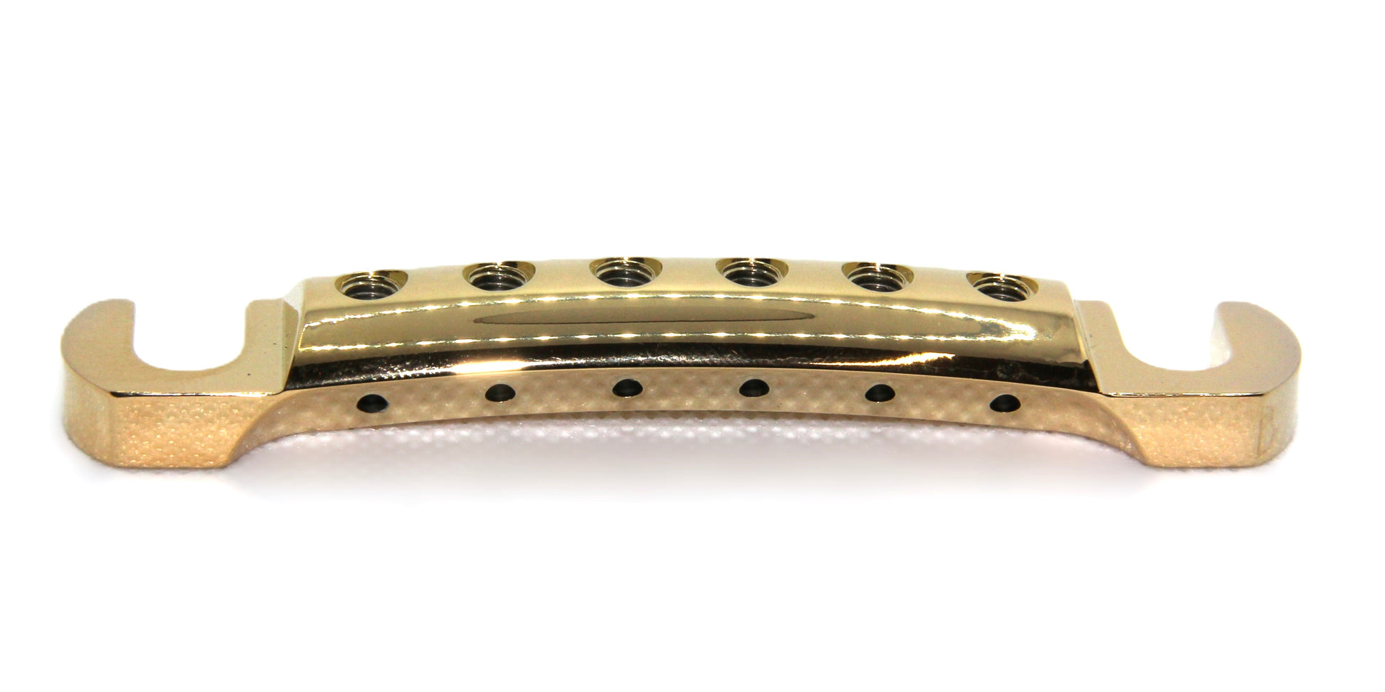 Rear view of shiny 24k gold lightweight aluminum guitar stopbar.