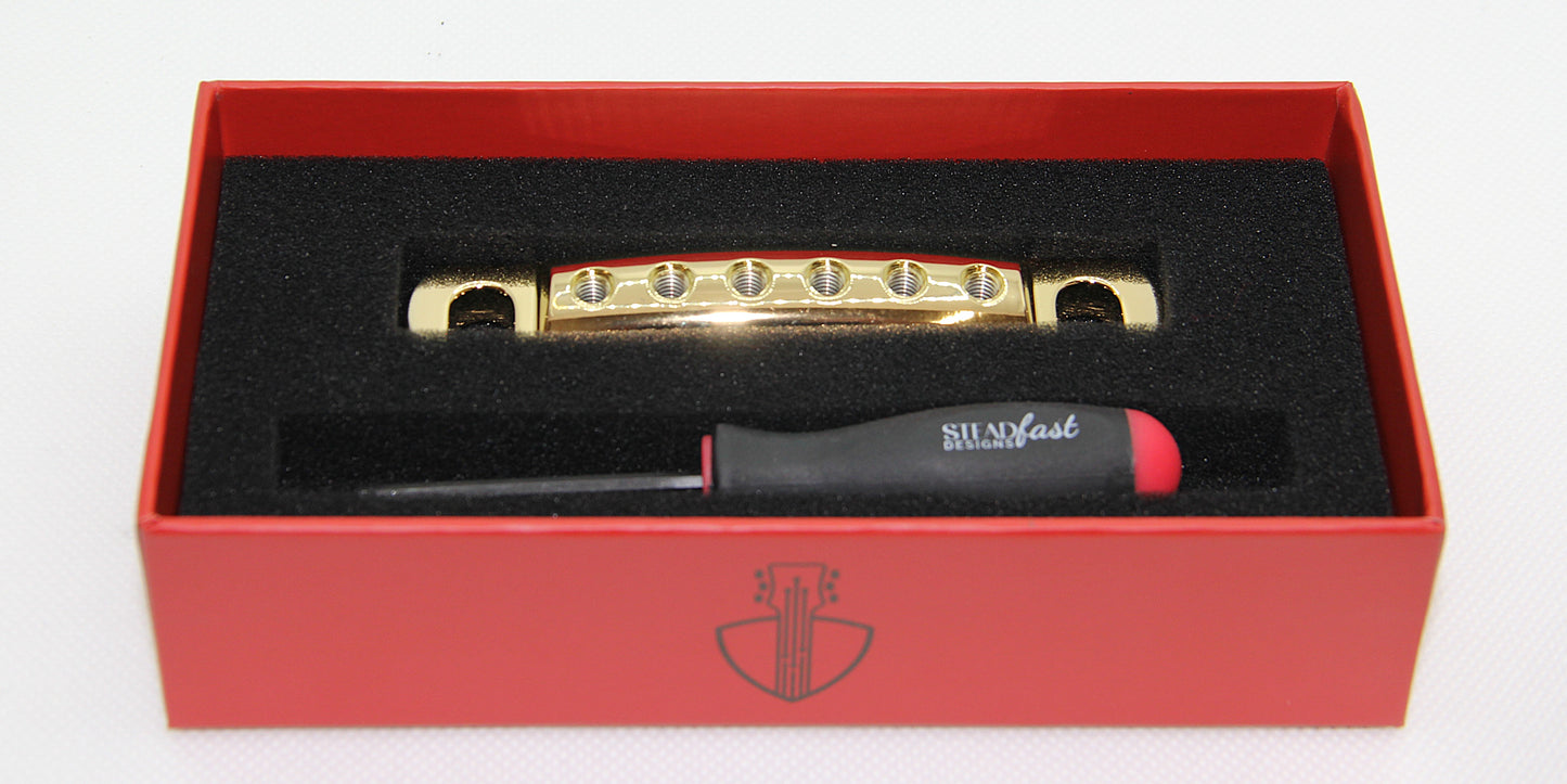 24k gold lightweight aluminum guitar stopbar in box with hex tool.