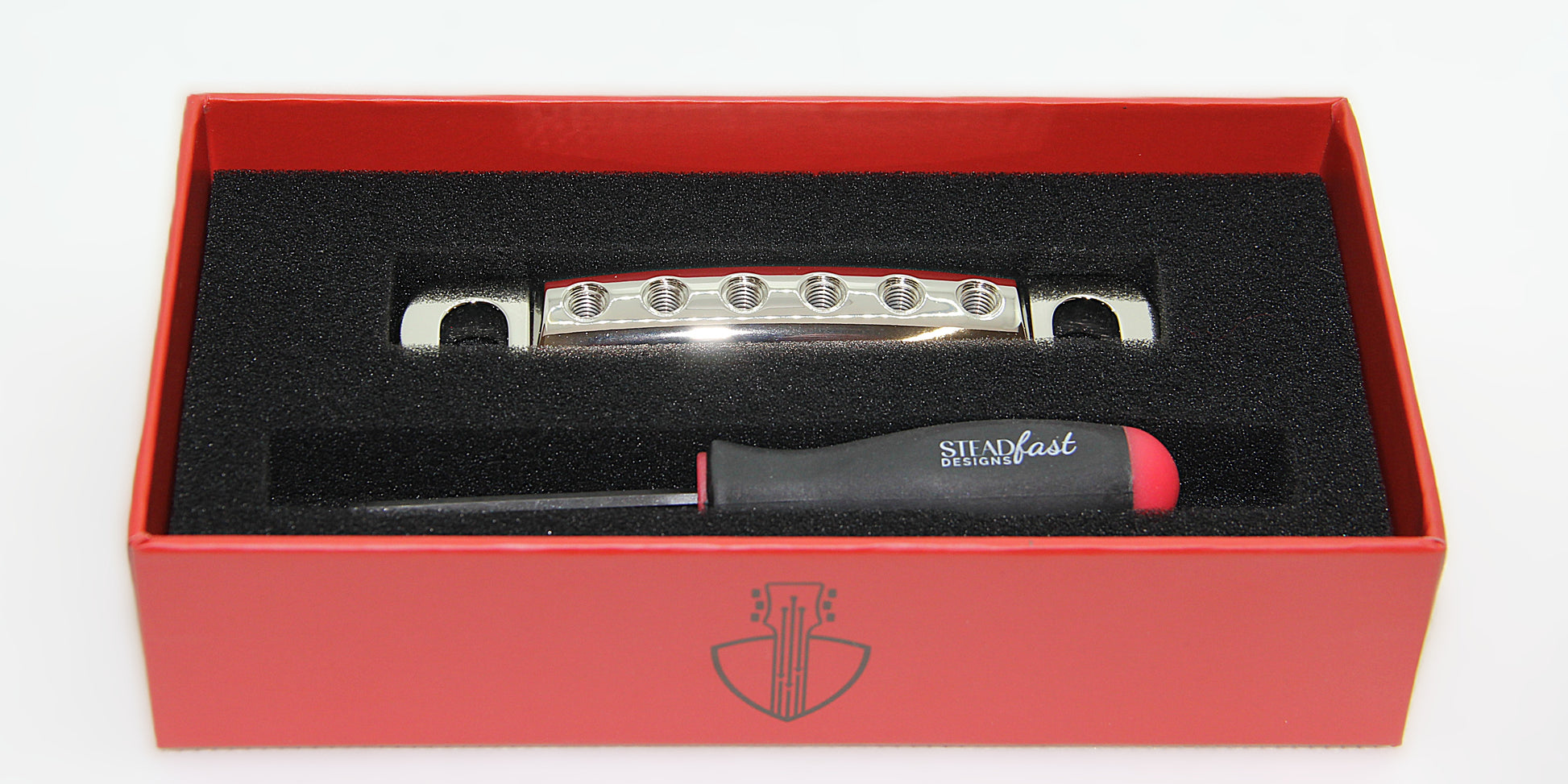 Nickel plated guitar stopbar lightweight aluminum in box with hex tool.