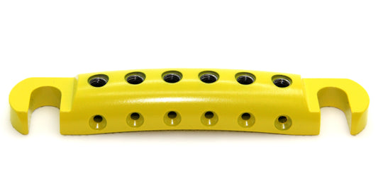 Yellow Cerakote lightweight aluminum guitar stopbar with black screws.